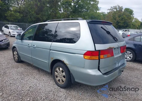 2002 Honda Odyssey Ex-L z USA, uszkodzony, nr VIN 2HKRL18052H588475